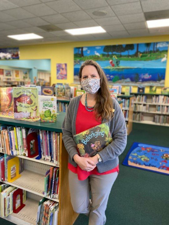 New Youth Services Librarian Lisa Calvert hosts book clubs for the Ponte Vedra Beach Branch Library and recently read to kids and their families for “Family Storytime at Bird Island Park.